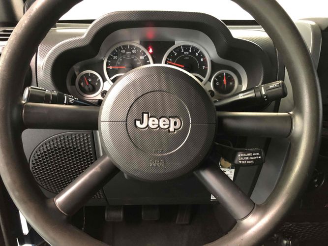 2010 Jeep Wrangler Unlimited Sport Mile High Car Helper