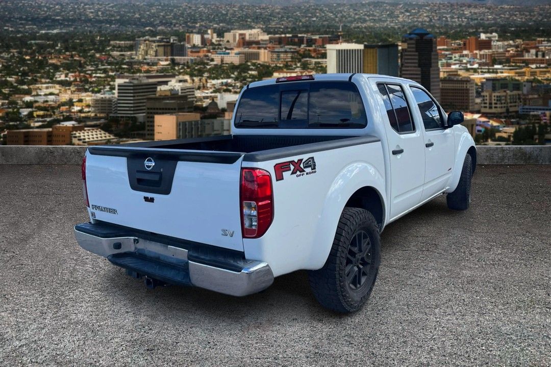 View vehicle photo 4