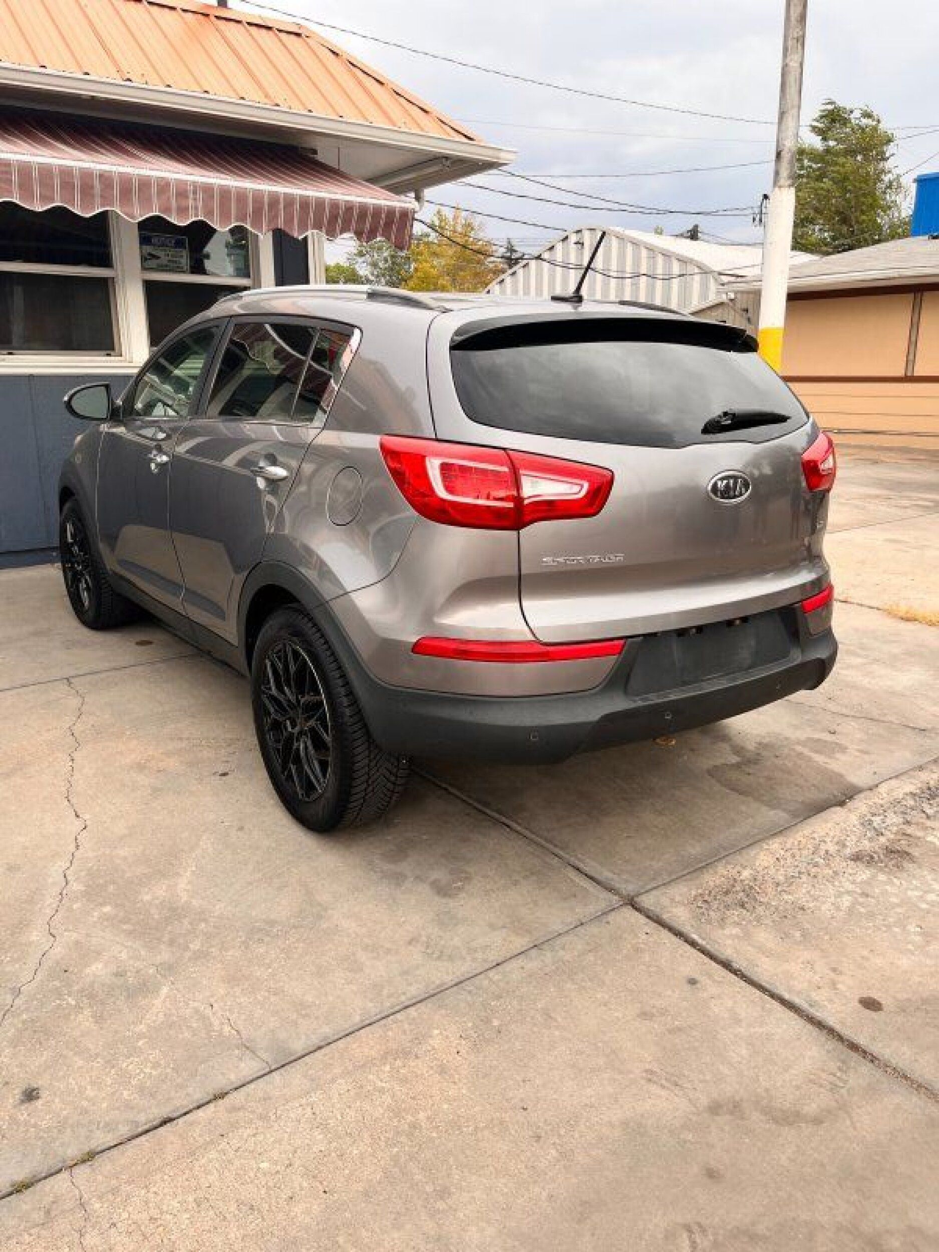 2012 Kia Sportage EX - Tan exterior view 3
