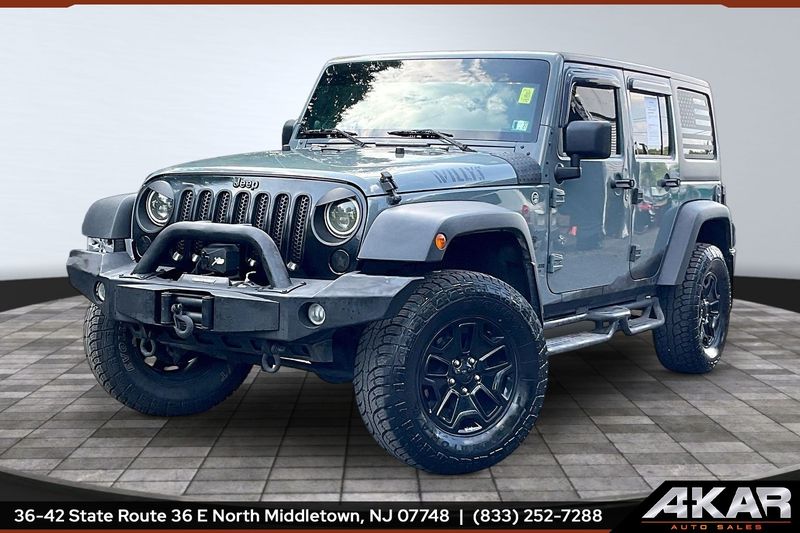 Gray 2014 Jeep Wrangler Unlimited Willys Wheeler Edition 4WD SUV / Crossover Four-Wheel Drive 6-Speed Manual