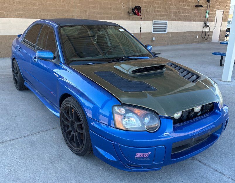 2005 Subaru Impreza WRX STI- GOLD WHEELS's photo