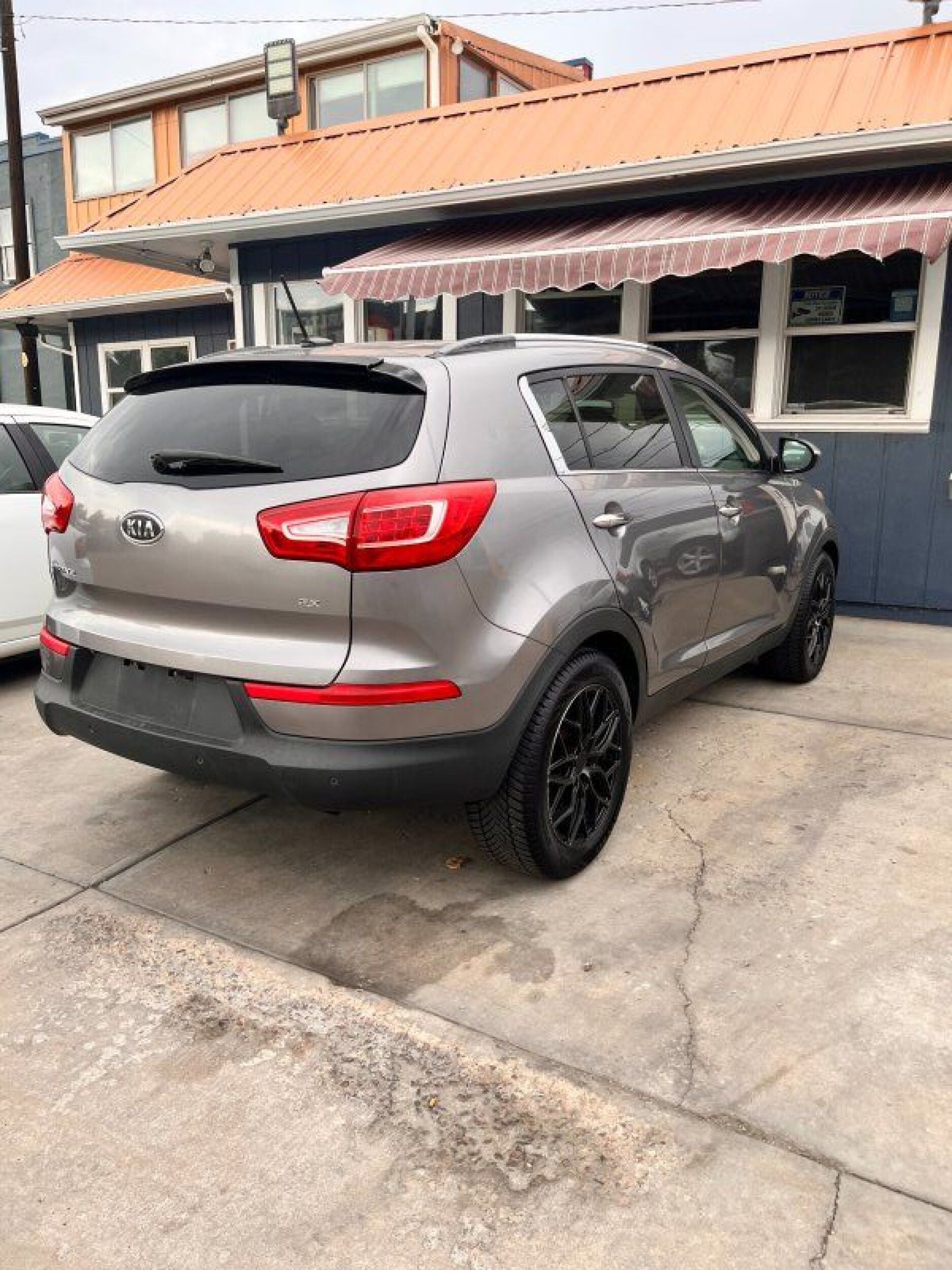 2012 Kia Sportage EX - Tan exterior view 4
