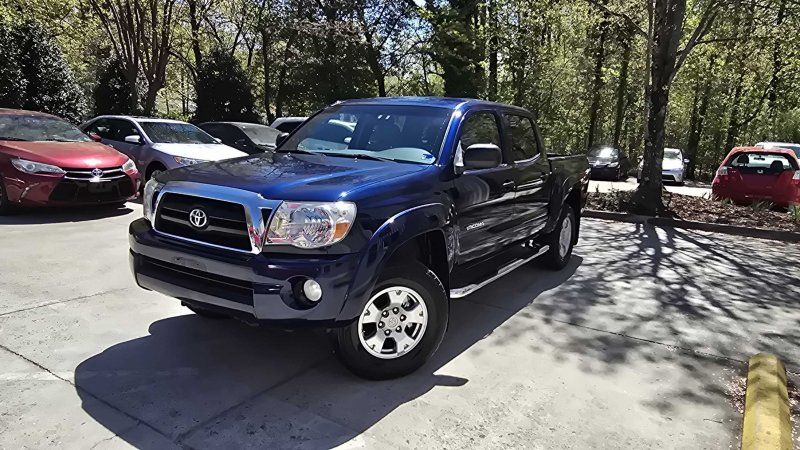 Blue 2006 Toyota Tacoma V6 4dr Double Cab 4WD SB with manual Pickup Truck Four-Wheel Drive 6-Speed Manual