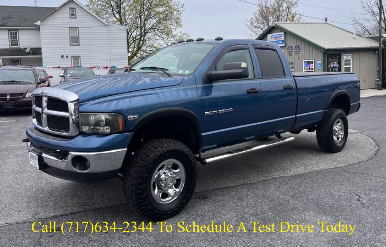 Blue 2004 Dodge RAM 2500 Pickup Truck Four-Wheel Drive 5-Speed Manual