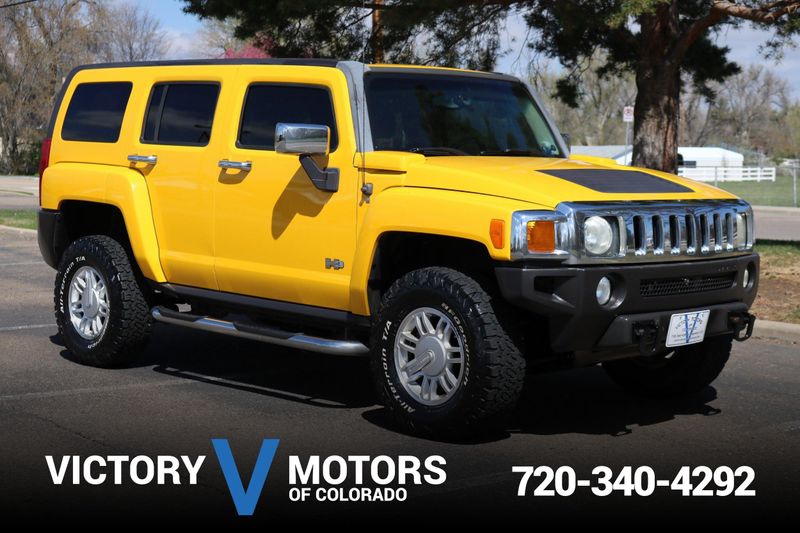 2006 Hummer H3 yellow - SuperStock