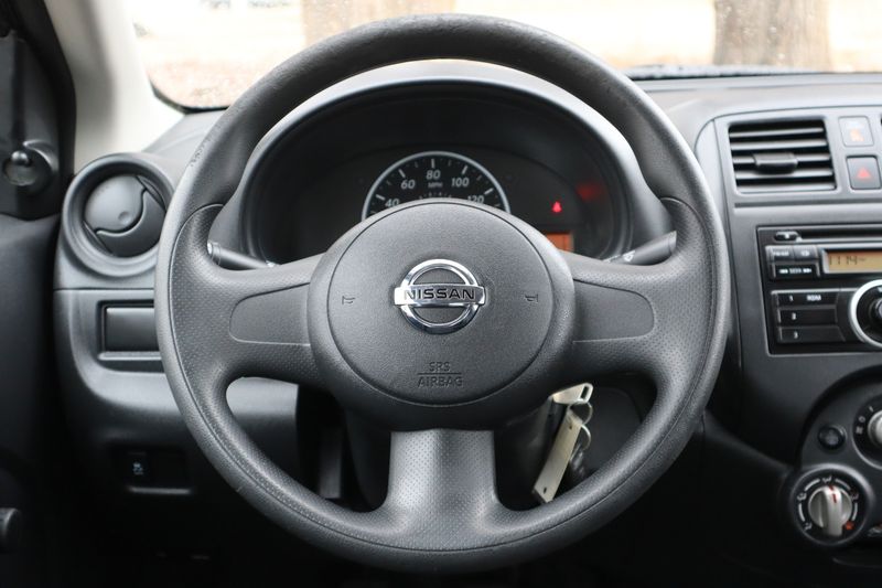 2013 nissan versa steering deals wheel size