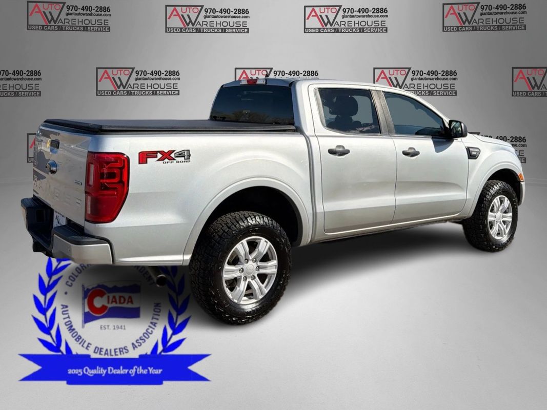 View vehicle photo 3