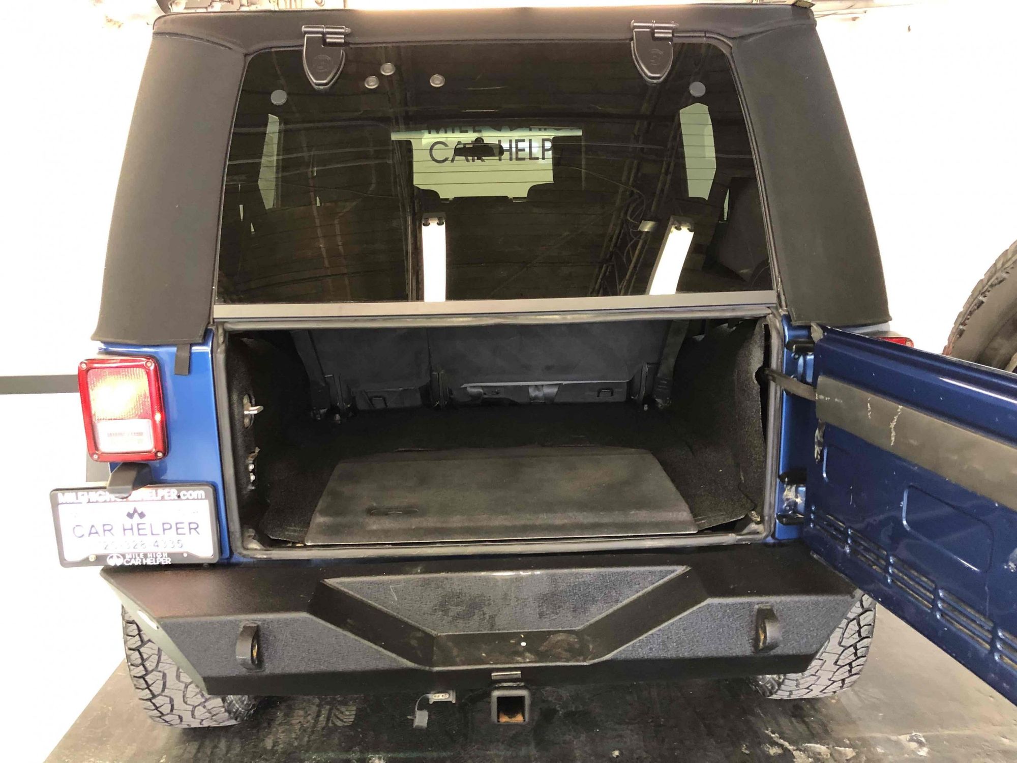 2010 Jeep Wrangler Unlimited Sport Mile High Car Helper