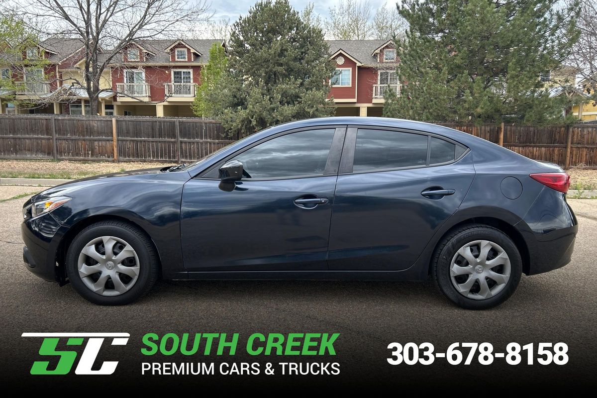 Blue 2015 Mazda MAZDA3 i SV Sedan Front-Wheel Drive 6-Speed Automatic