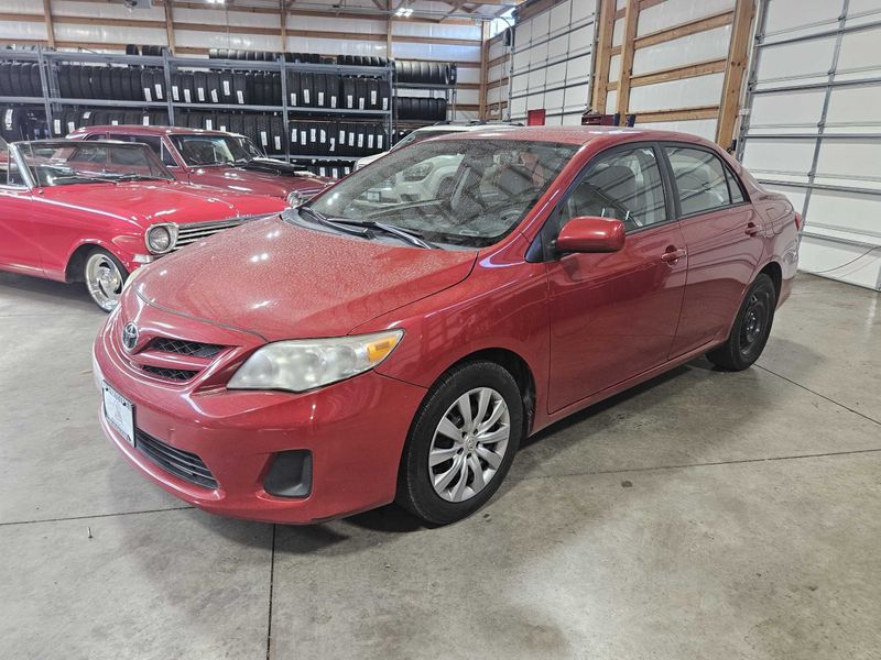 Red 2012 Toyota Corolla Sedan Front-Wheel Drive 4-Speed Automatic