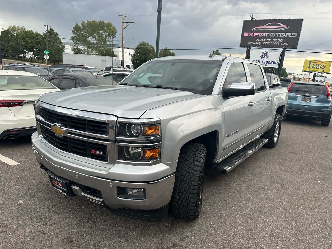 Silver 2014 Chevrolet Silverado 1500 Pickup Truck Four-Wheel Drive 6-Speed Automatic