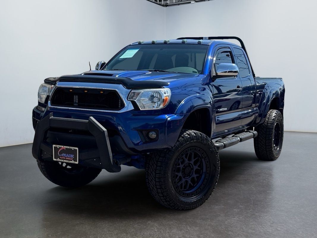Blue 2014 Toyota Tacoma Pickup Truck 5-Speed Manual