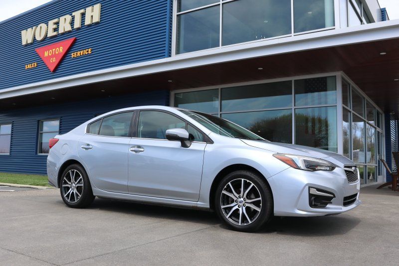 Silver 2017 Subaru Impreza 2.0i Limited Sedan All-Wheel Drive 7-Speed CVT