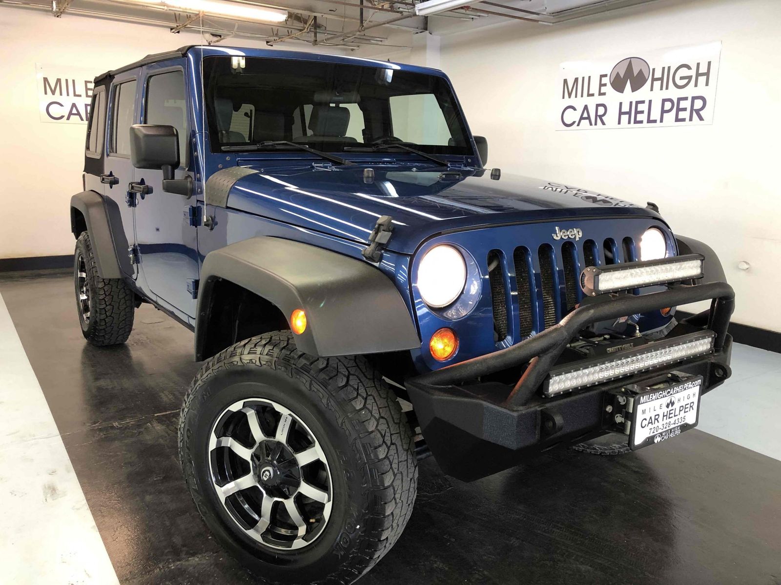 2010 Jeep Wrangler Unlimited Sport Mile High Car Helper