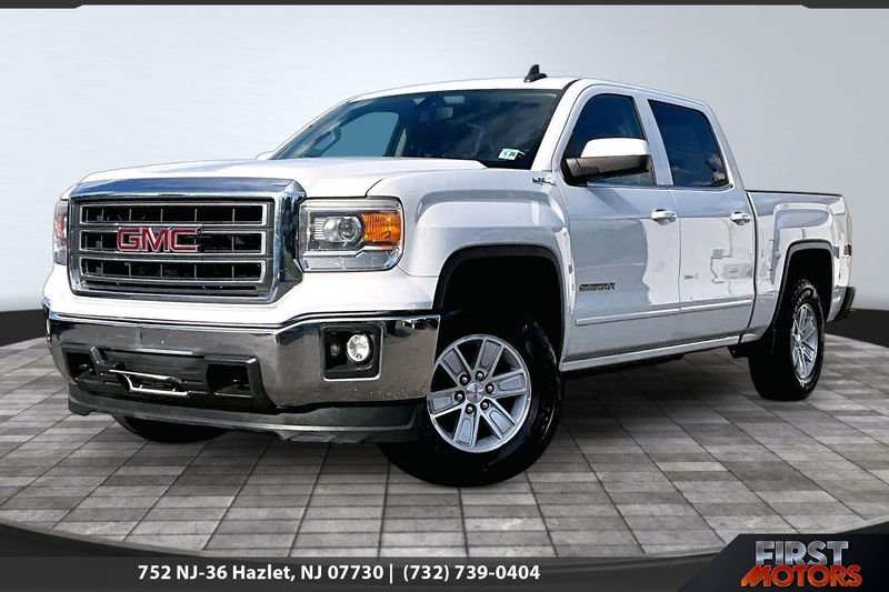 White 2015 GMC Sierra 1500 Pickup Truck Four-Wheel Drive 