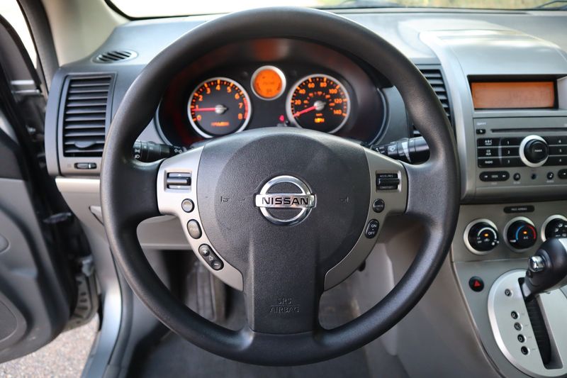 2009 nissan sentra steering deals wheel size