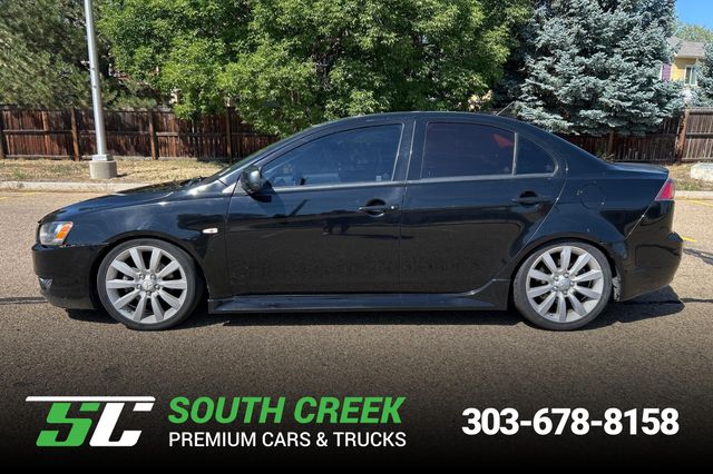 Black 2011 Mitsubishi Lancer Sedan Front-Wheel Drive 5-Speed Manual