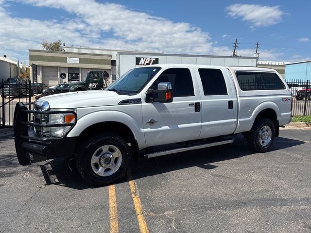 White 2011 Ford F-350 Super Duty Pickup Truck Four-Wheel Drive 6-Speed Automatic