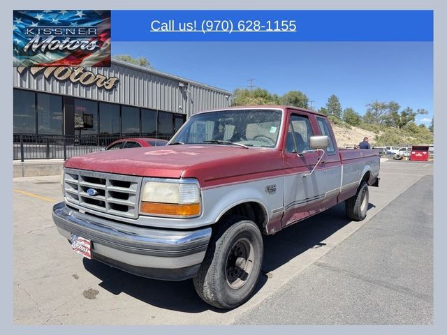 Red 1992 Ford F-150 Pickup Truck