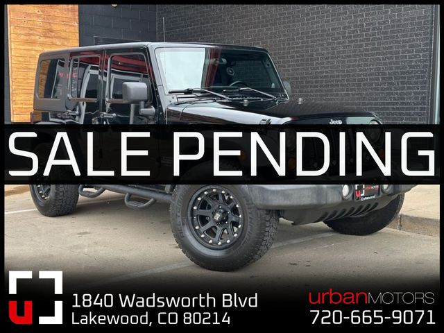 Black 2012 Jeep Wrangler Unlimited Sport 4WD SUV / Crossover Four-Wheel Drive