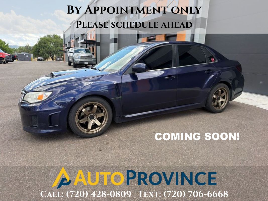 Blue 2014 Subaru Impreza WRX Sedan All-Wheel Drive 5-Speed Manual
