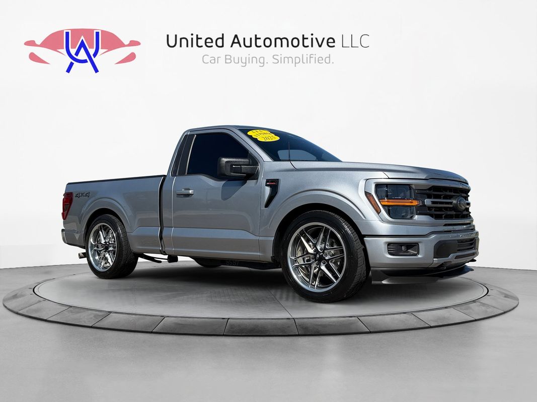 View vehicle photo 3