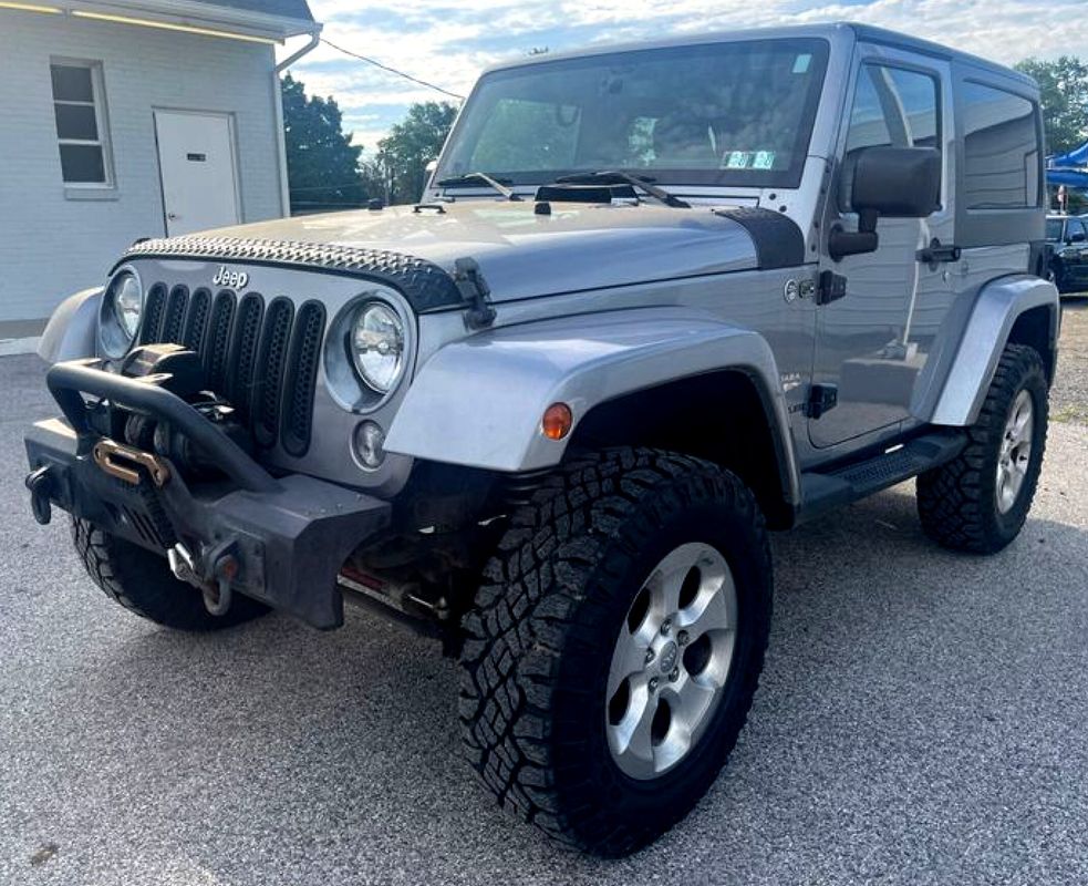 Silver 2014 Jeep Wrangler Sahara 4WD SUV / Crossover Four-Wheel Drive 6-Speed Manual