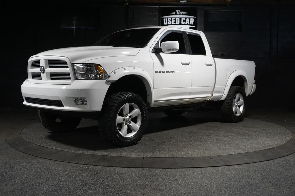 White 2011 RAM 1500 Sport Quad Cab 4WD Pickup Truck Four-Wheel Drive 5-Speed Automatic