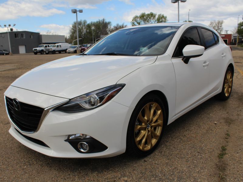 2014 mazda 3 touring value